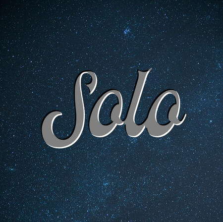 The word "solo" with stars behind it