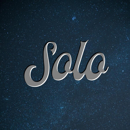 The word "solo" with stars behind it